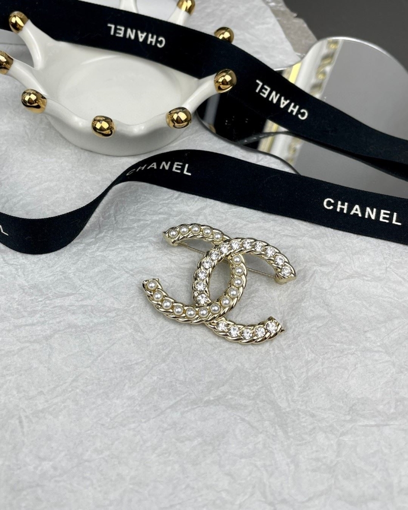Ch**el brooches